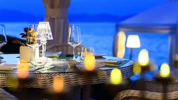 Breakfast, lunch, dinner served; Greek cuisine, beach views