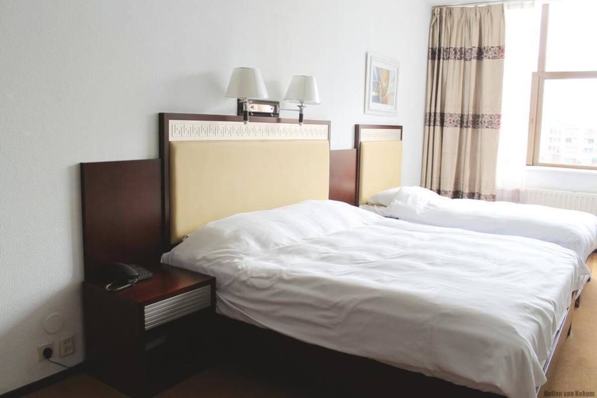 Triple Room | Desk, iron/ironing board, free WiFi, bed sheets