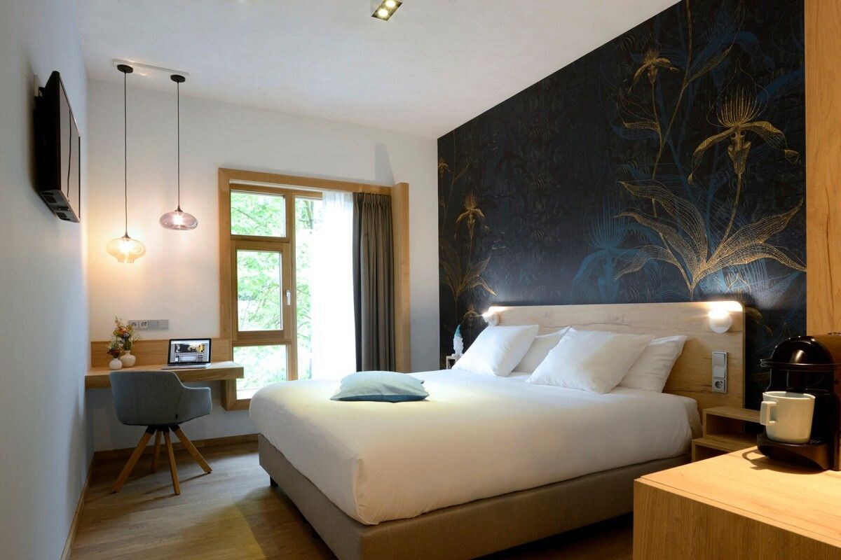 Habitación Deluxe con 1 cama matrimonial o 2 individuales | Ropa de cama hipoalergénica y escritorio