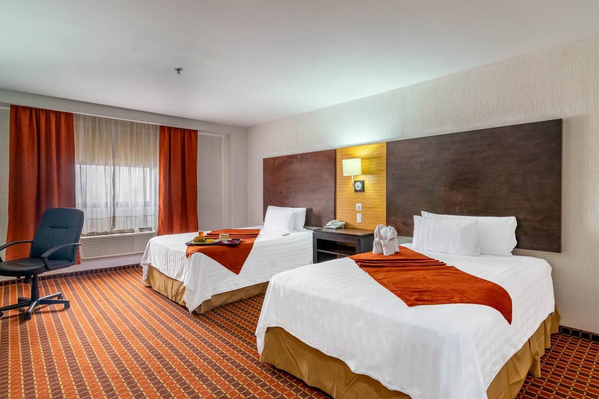 Premium bedding, down comforters, in-room safe, desk