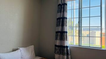 Desk, free WiFi, bed sheets