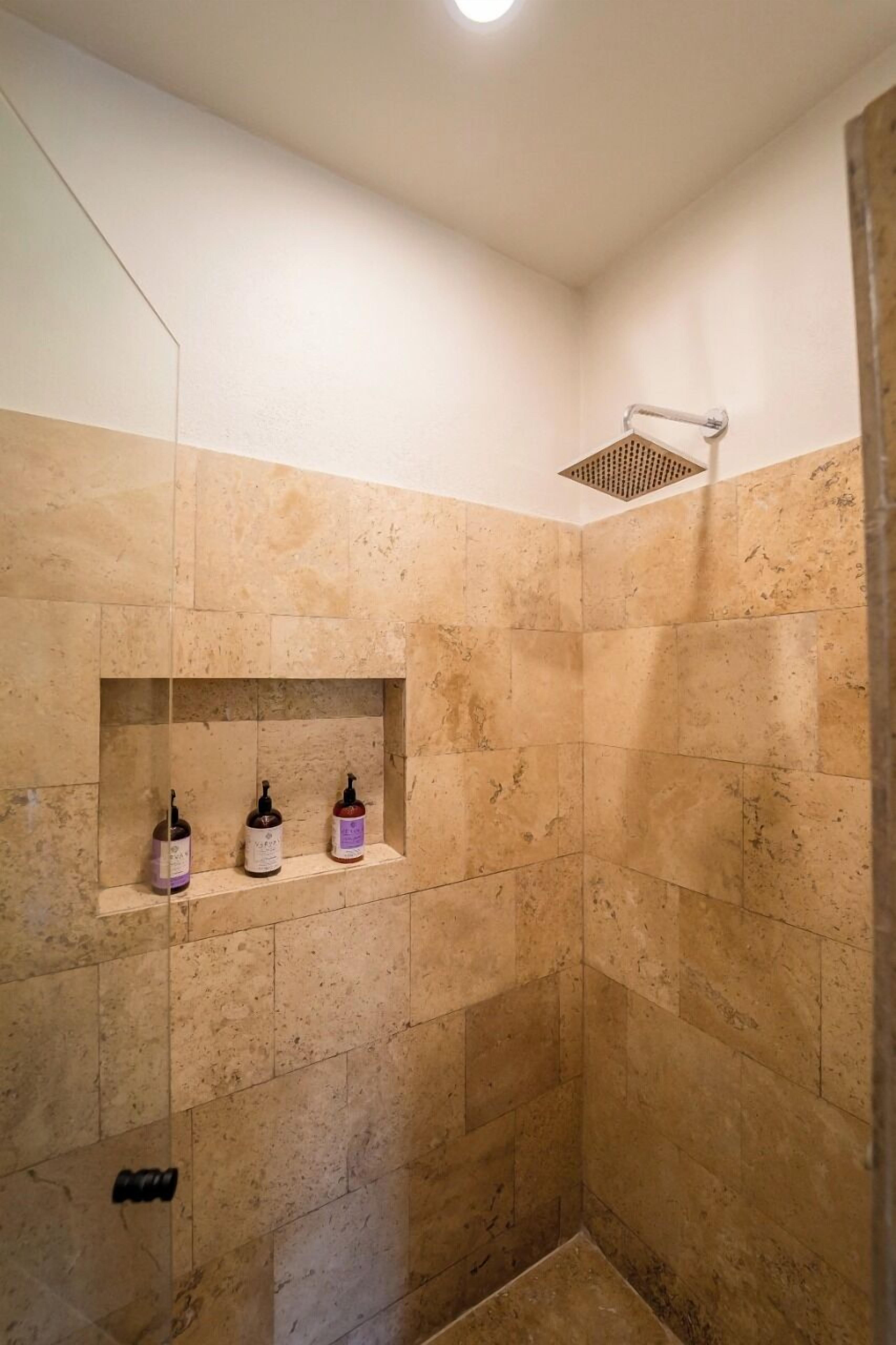 combined shower/bathtub, free toiletries, hair dryer, towels