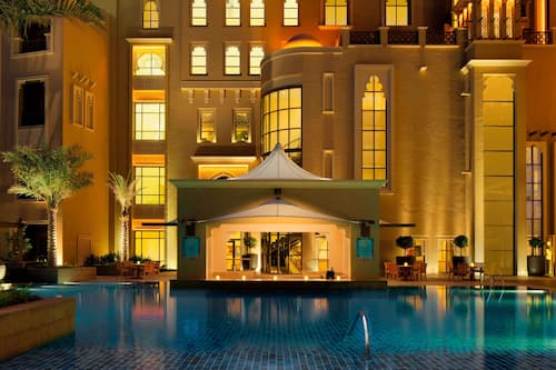 Outdoor pool, open 7:00 AM to 8:00 PM, pool umbrellas, pool loungers