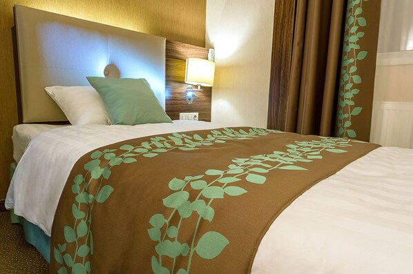 單人房 | 高級寢具、迷你吧、客房內保險箱、書桌