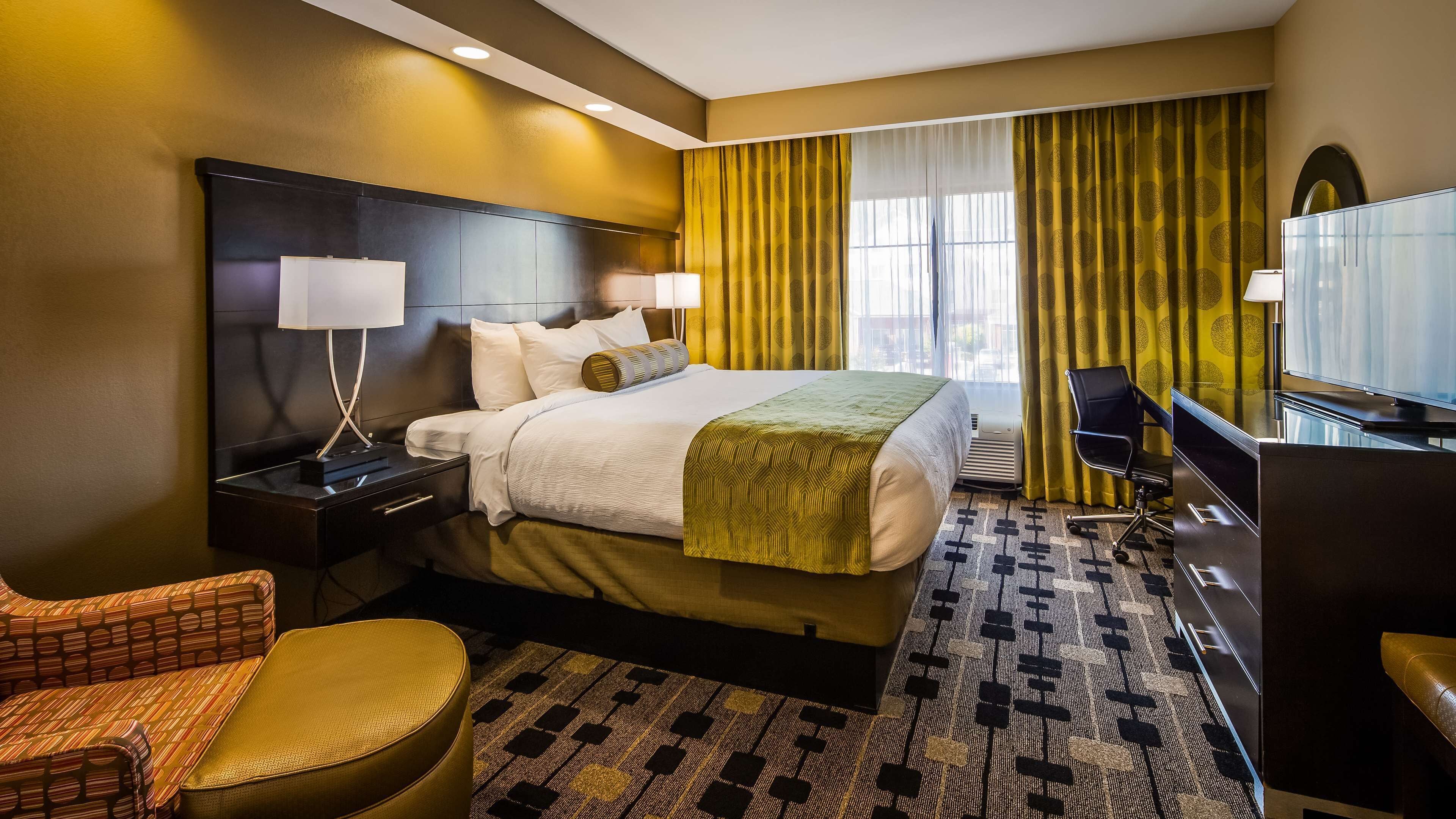 pillow-top beds, desk, laptop workspace, iron/ironing board