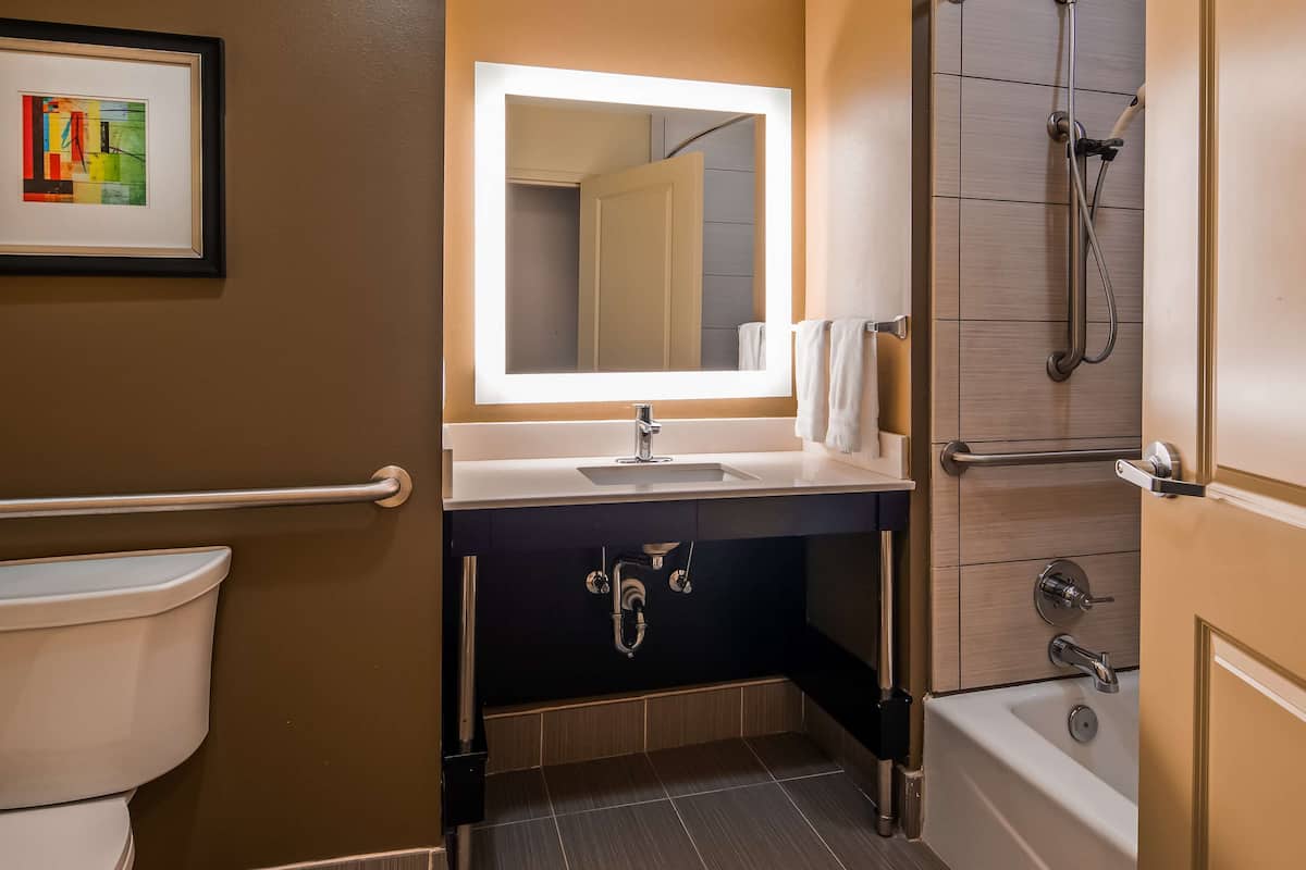 pillow-top beds, desk, laptop workspace, iron/ironing board