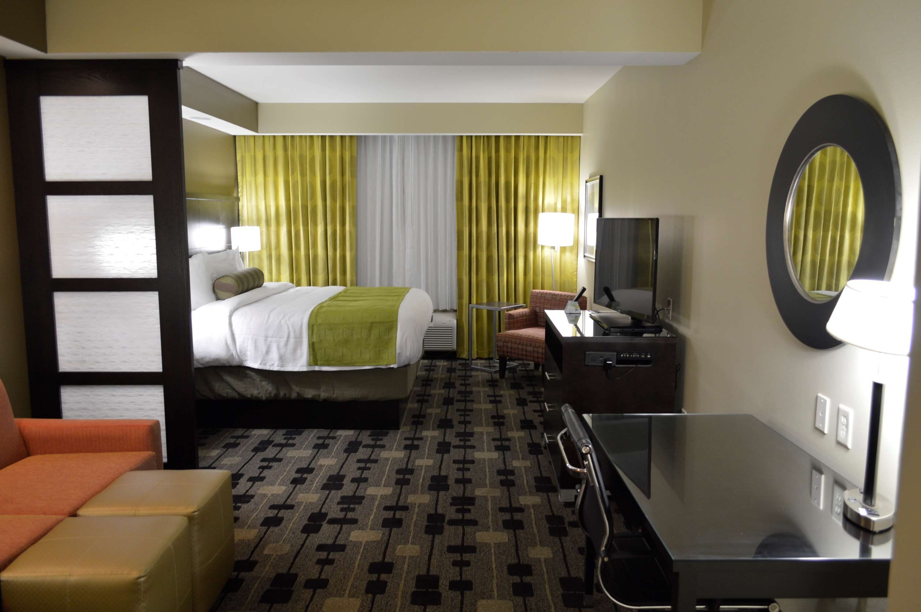 suite, 1 king bed, non smoking, refrigerator & microwave (with single sofabed) | pillow-top beds, desk, laptop workspace, iron/ironing board