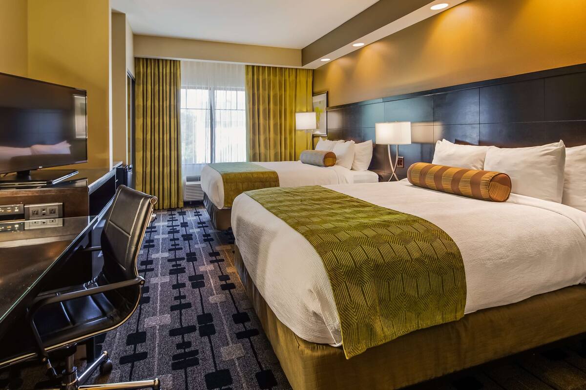 pillow-top beds, desk, laptop workspace, iron/ironing board