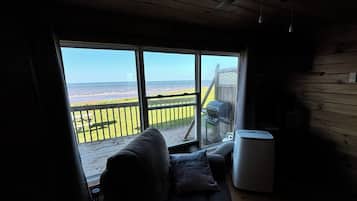 Appartement Duplex Standard, 2 chambres, vue océan, en front de plage | Coin séjour