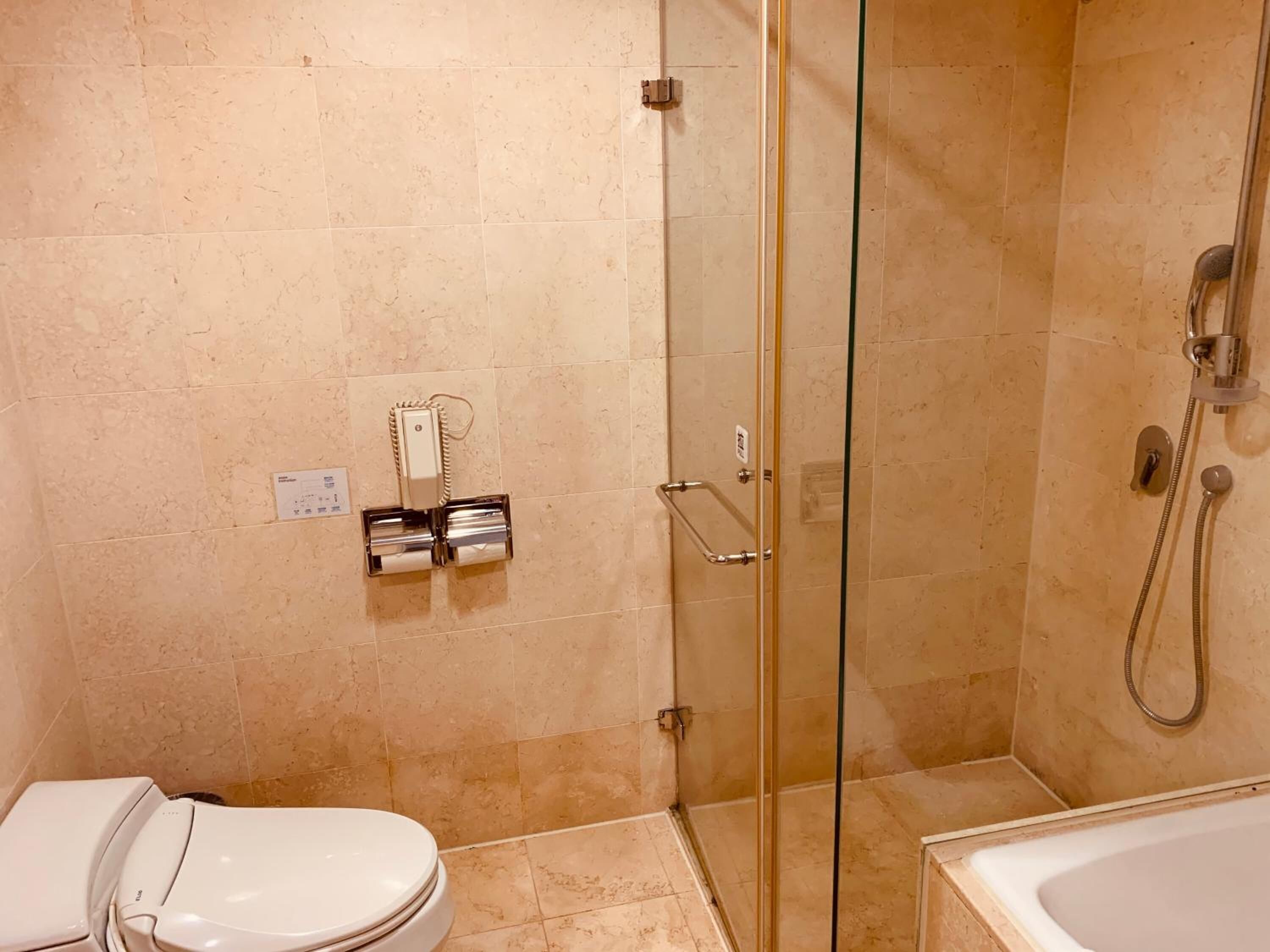 free toiletries, hair dryer, slippers, bidet