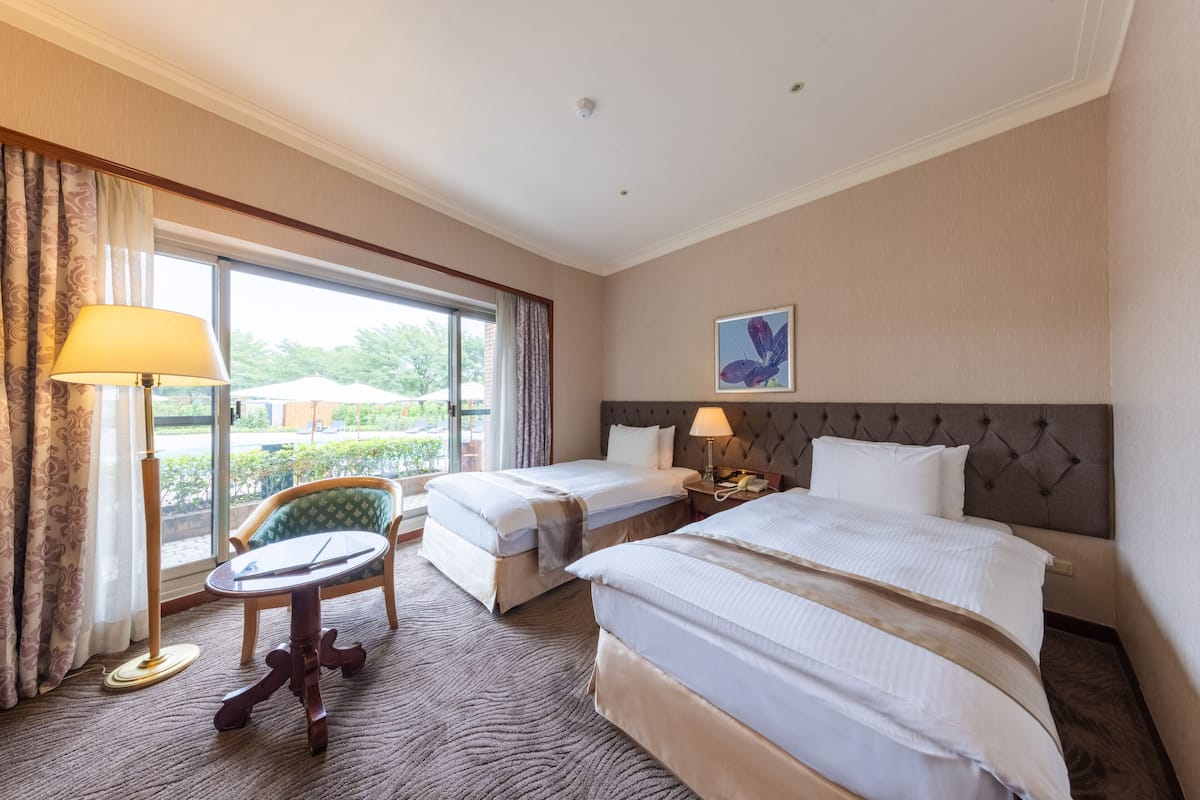 Elite Twin kamer | 1 slaapkamer, luxe beddengoed, donzen dekbedden, een kluis op de kamer