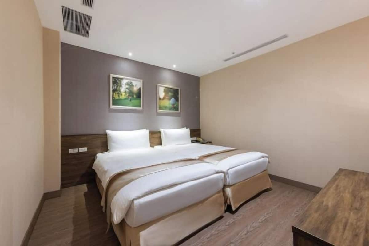 Premium bedding, down duvets, in-room safe, desk