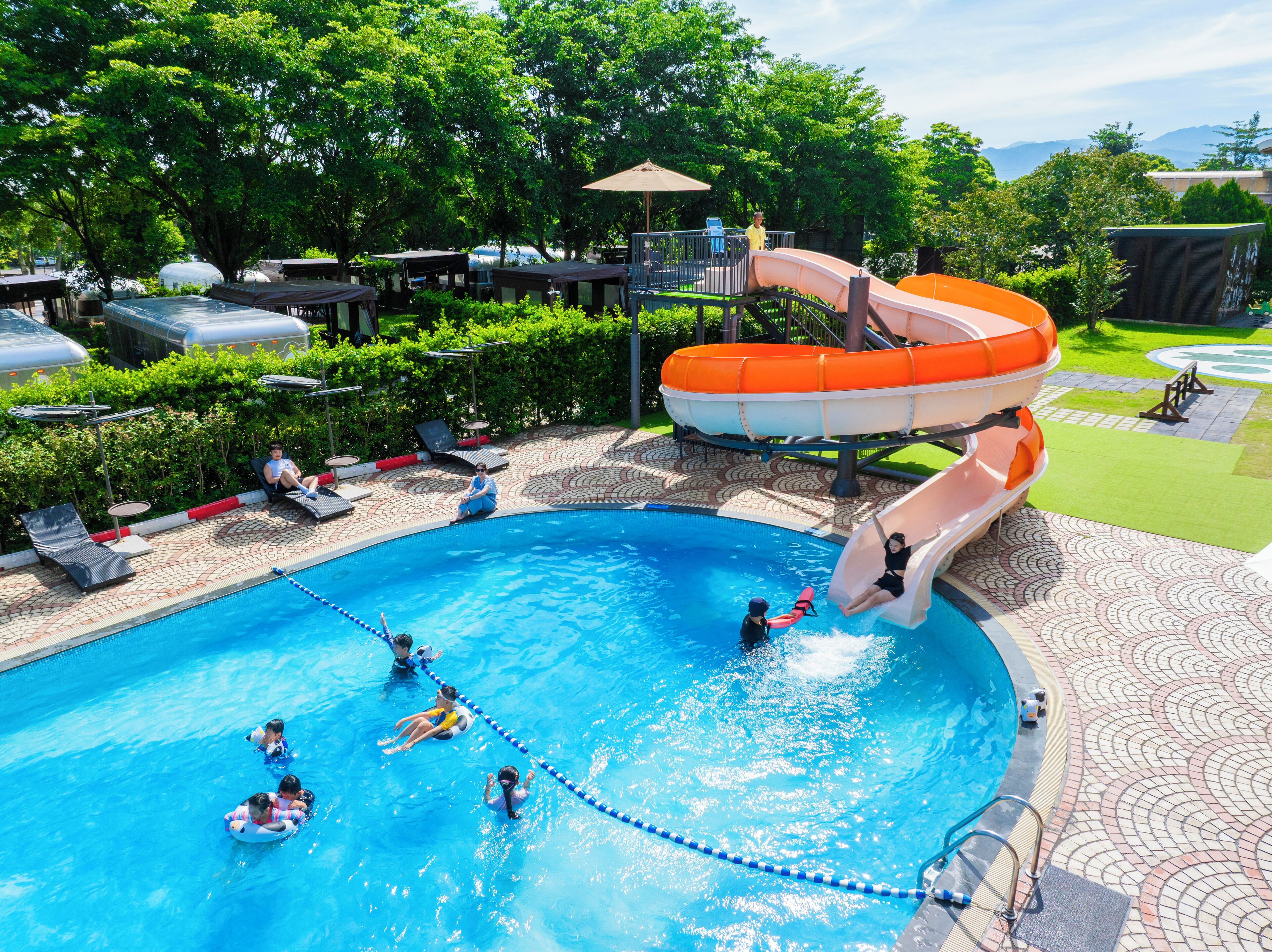 seasonal outdoor pool, pool umbrellas, pool loungers