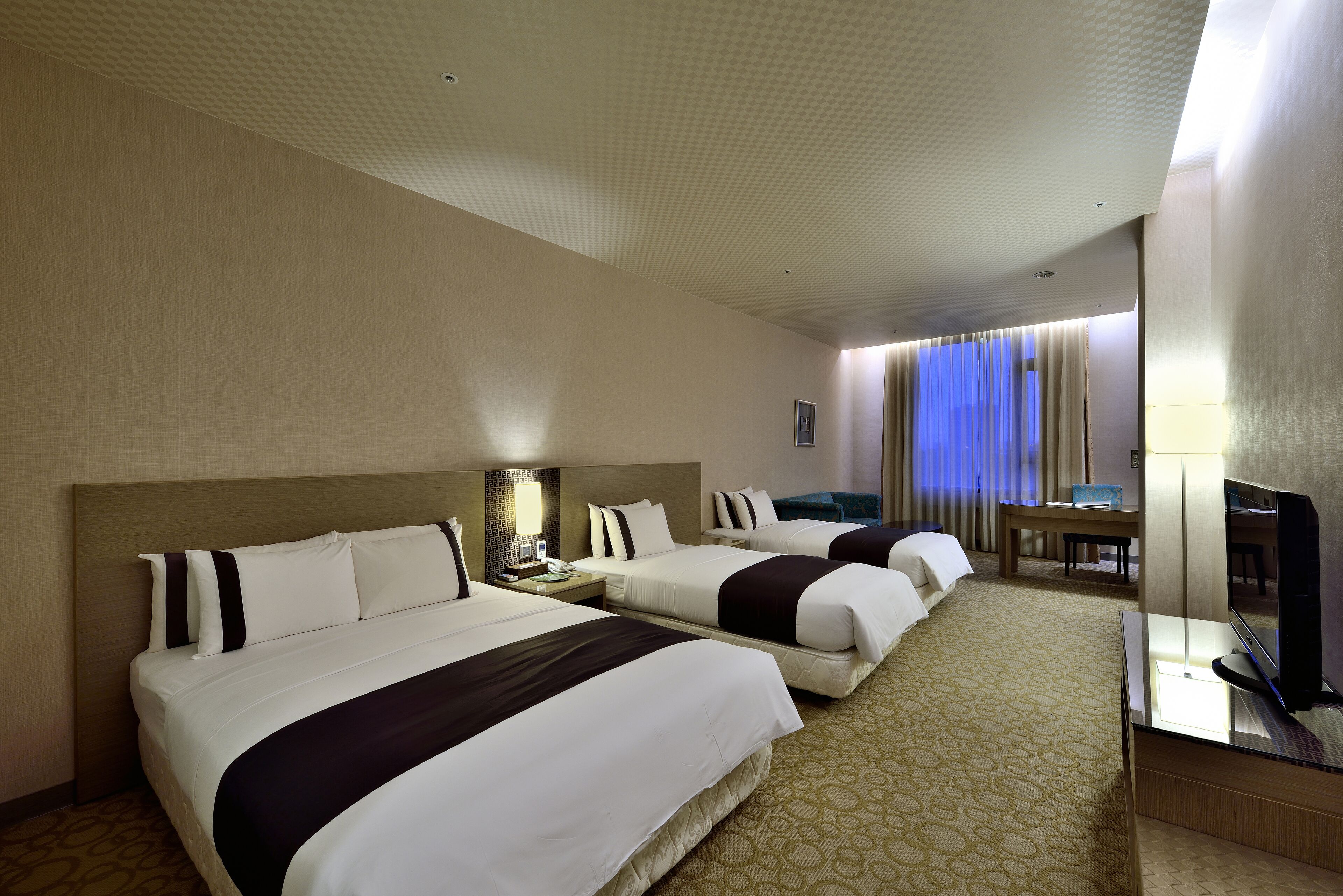 business quadruple room | 1 bedroom, down duvets, minibar, in-room safe