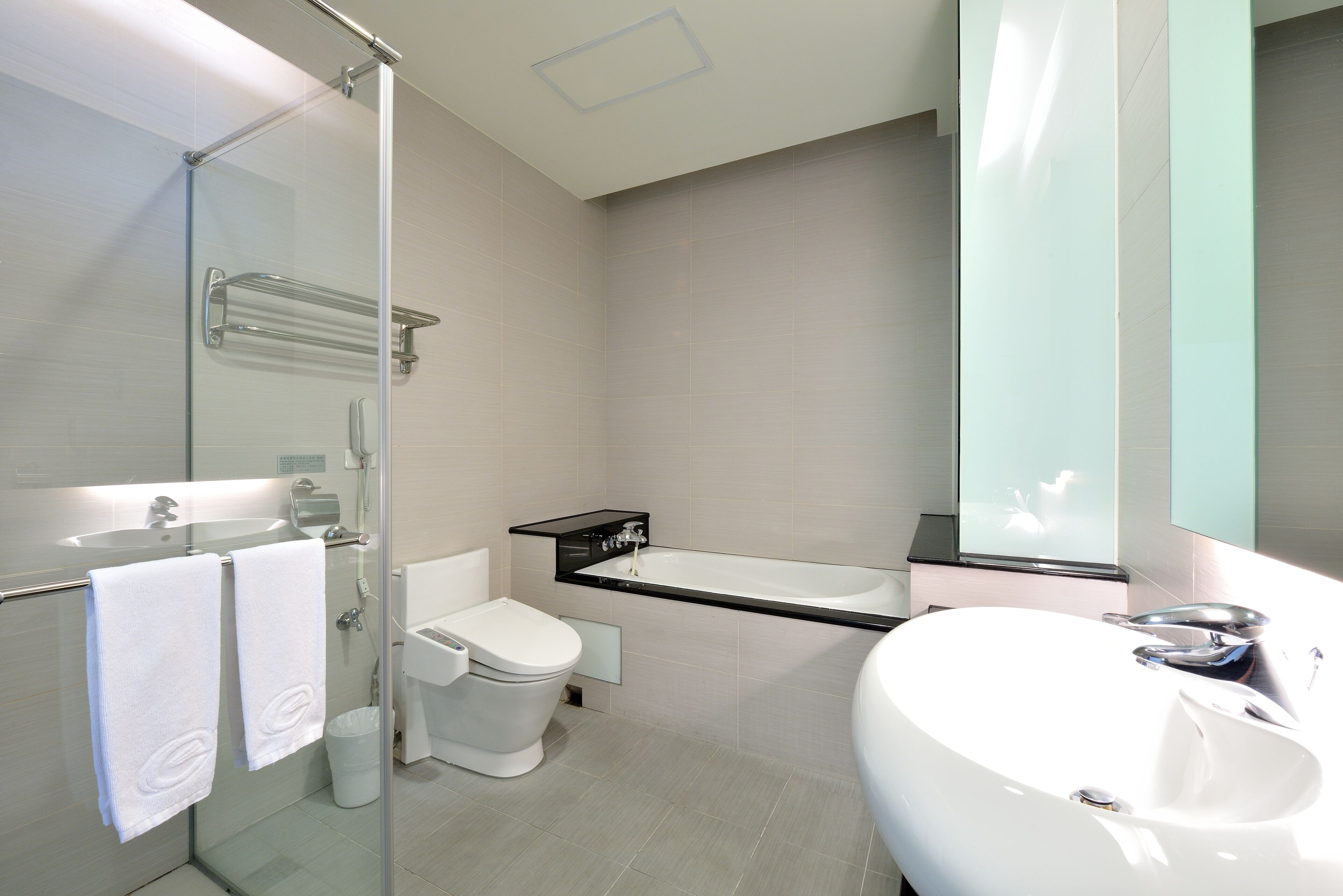 separate bathtub and shower, deep-soaking bathtub, free toiletries