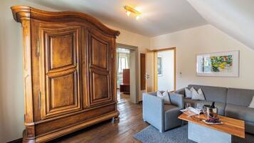 Junior Suite, City View | Living area | Flat-screen TV
