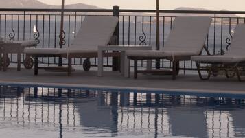 Outdoor pool, sun loungers