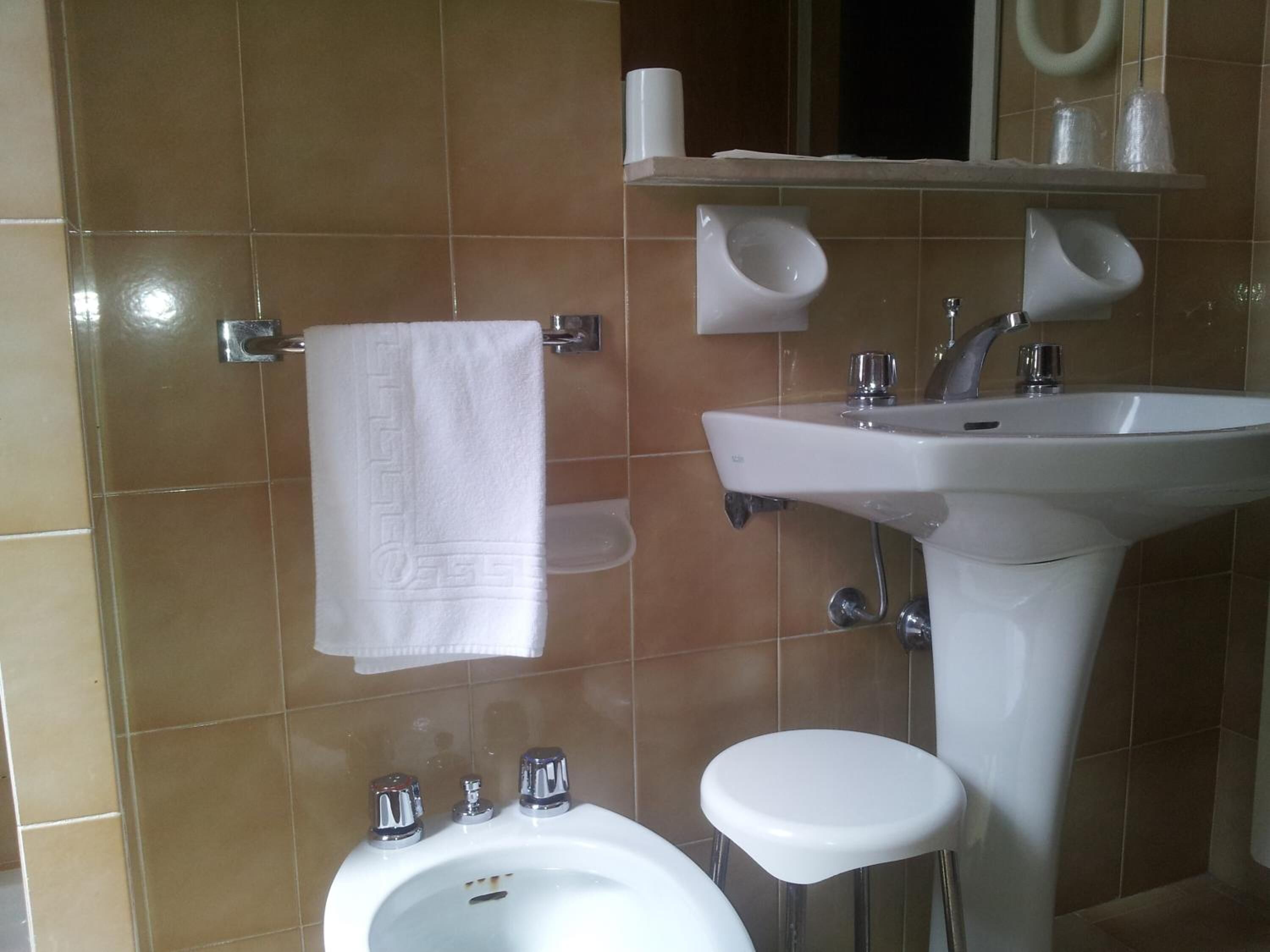 standard double or twin room | bathroom | free toiletries, hair dryer, slippers, bidet