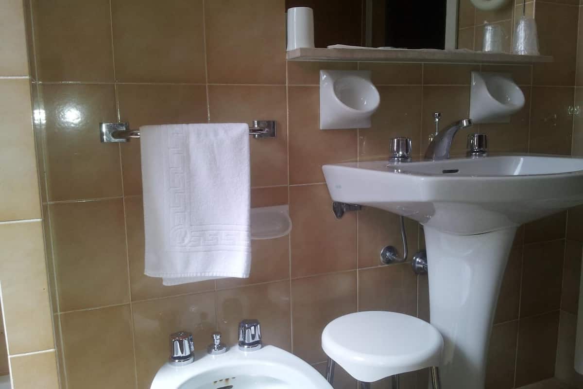 standard double or twin room | bathroom | free toiletries, hair dryer, slippers, bidet