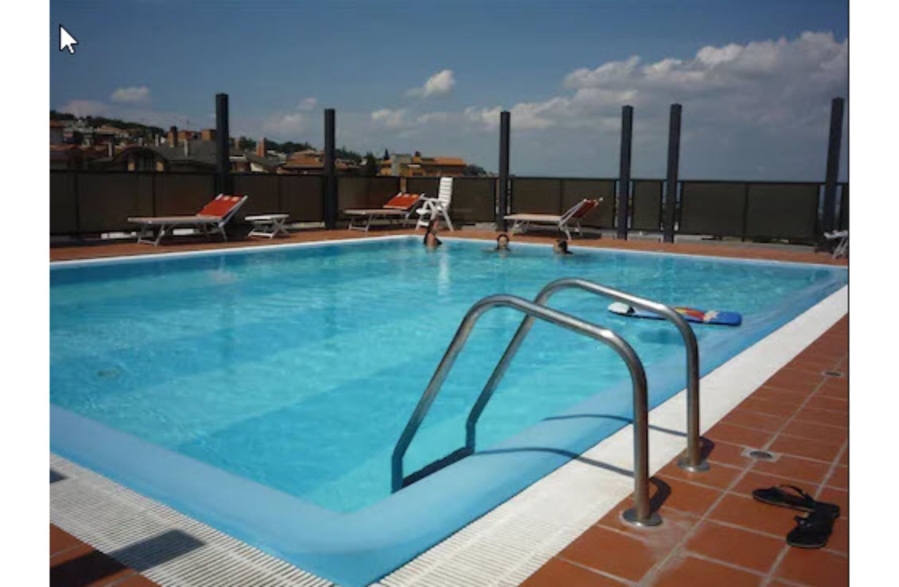 seasonal outdoor pool, pool loungers