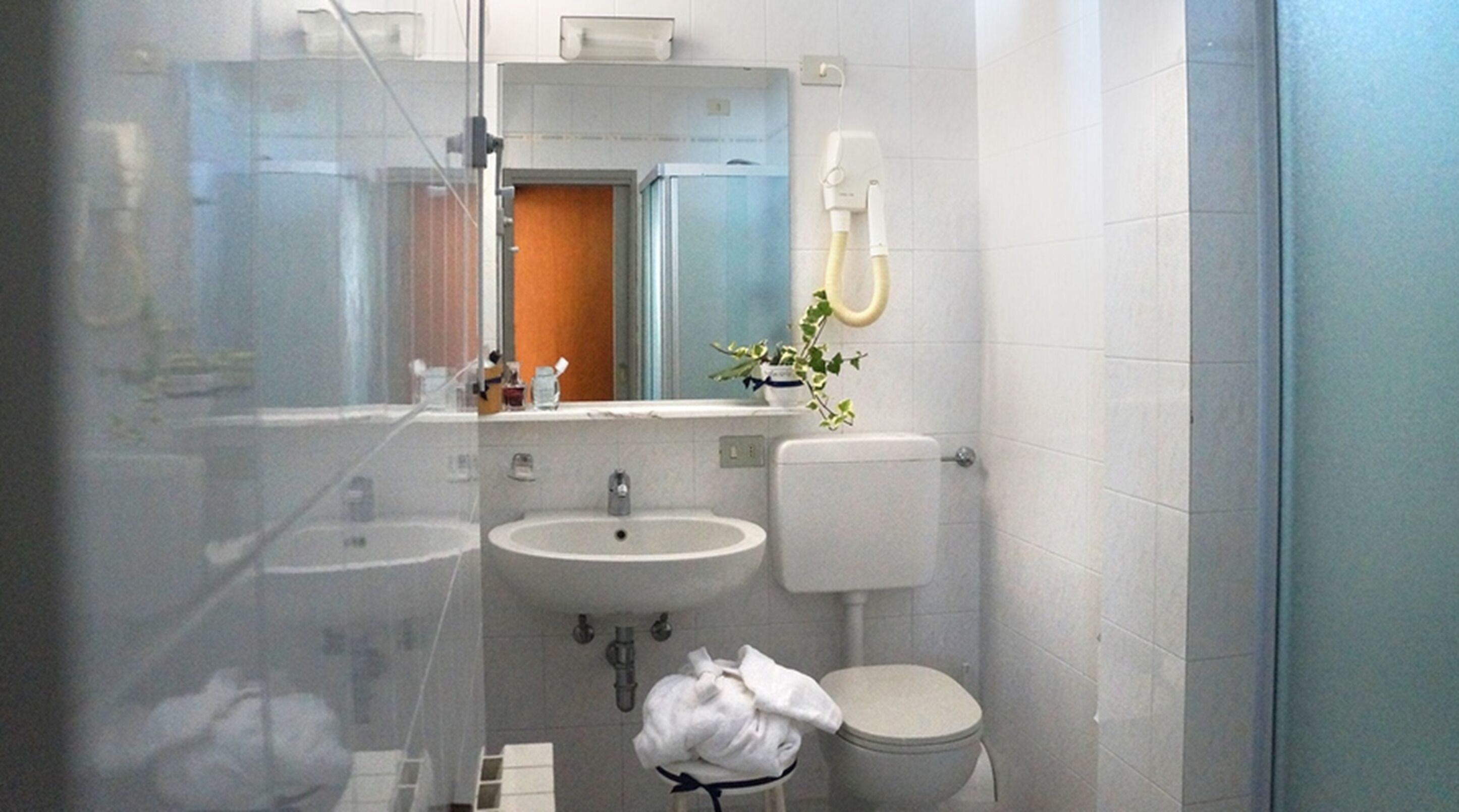 free toiletries, hair dryer, slippers, bidet