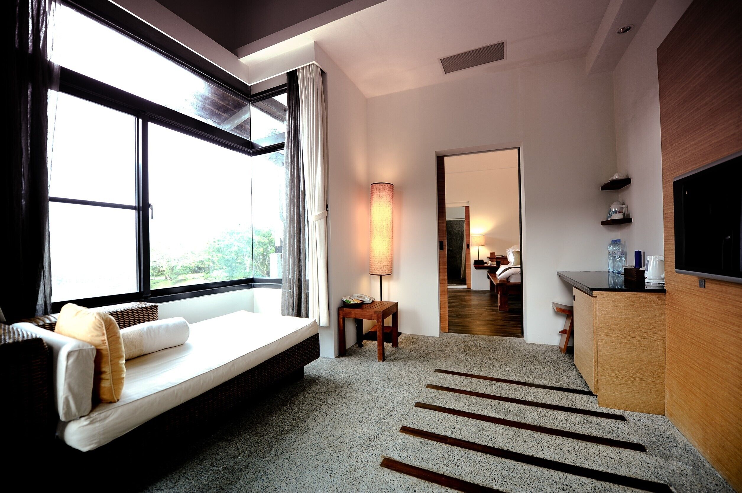 honeymoon villa, lake view | living area | flat-screen tv