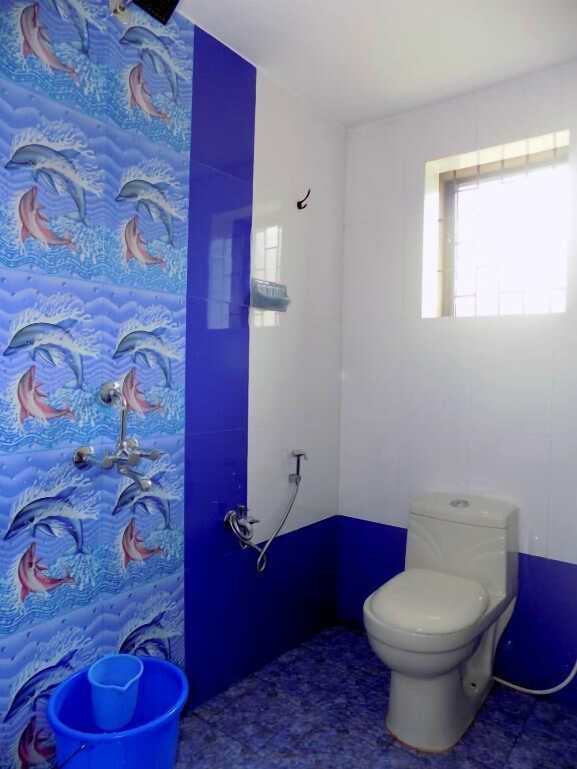 Standard Room (AC) | Bathroom | Shower, towels