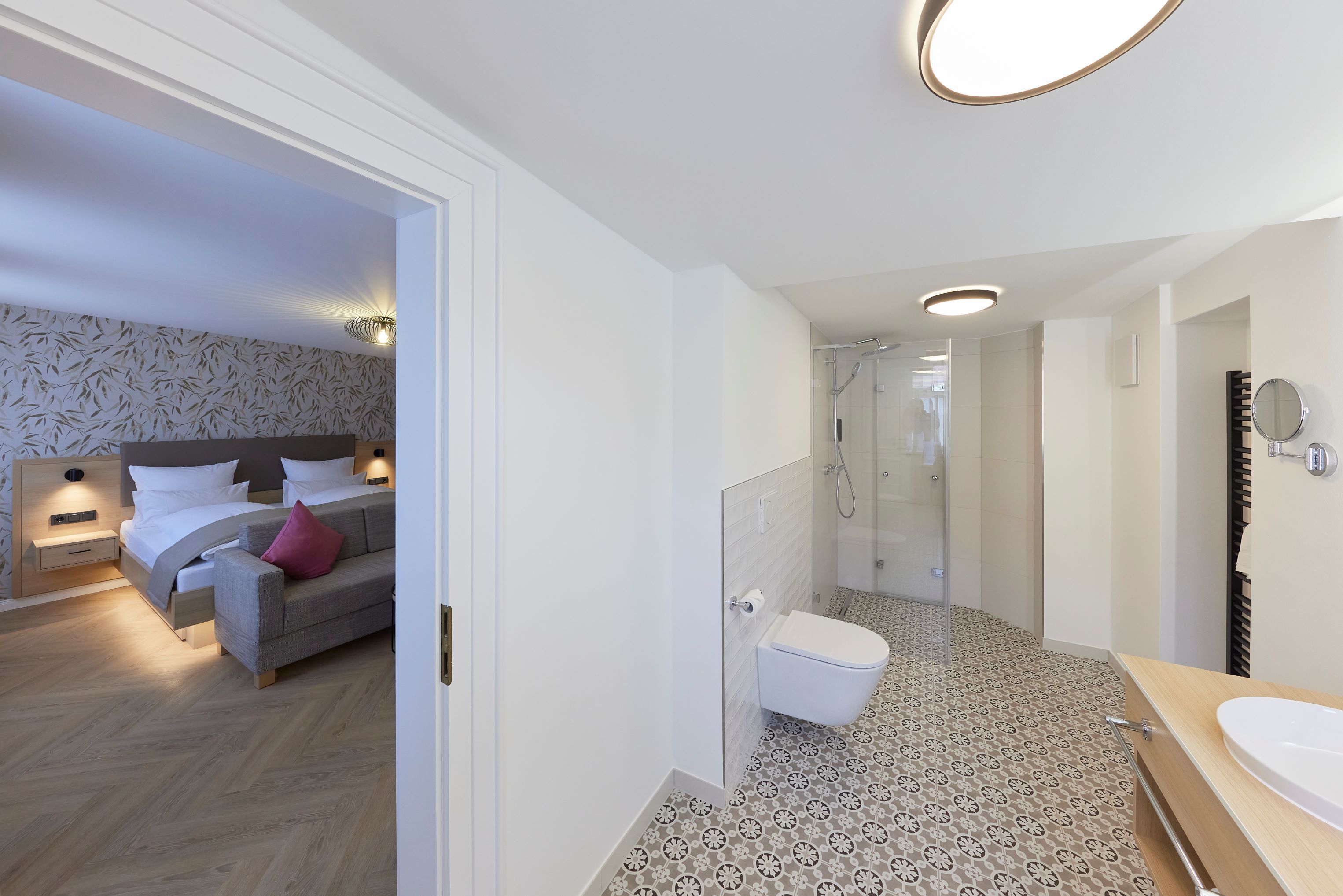 deluxe double room, 1 king bed, refrigerator | bathroom | shower, rainfall showerhead, free toiletries, hair dryer