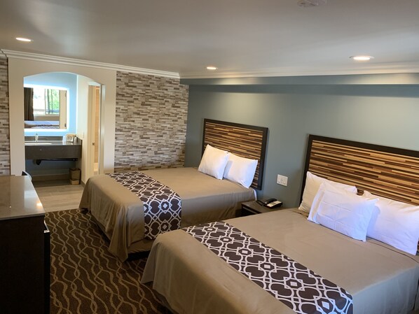 Deluxe Double 2 Queen Beds Non Smoking | Blackout drapes, iron/ironing board, free WiFi, bed sheets