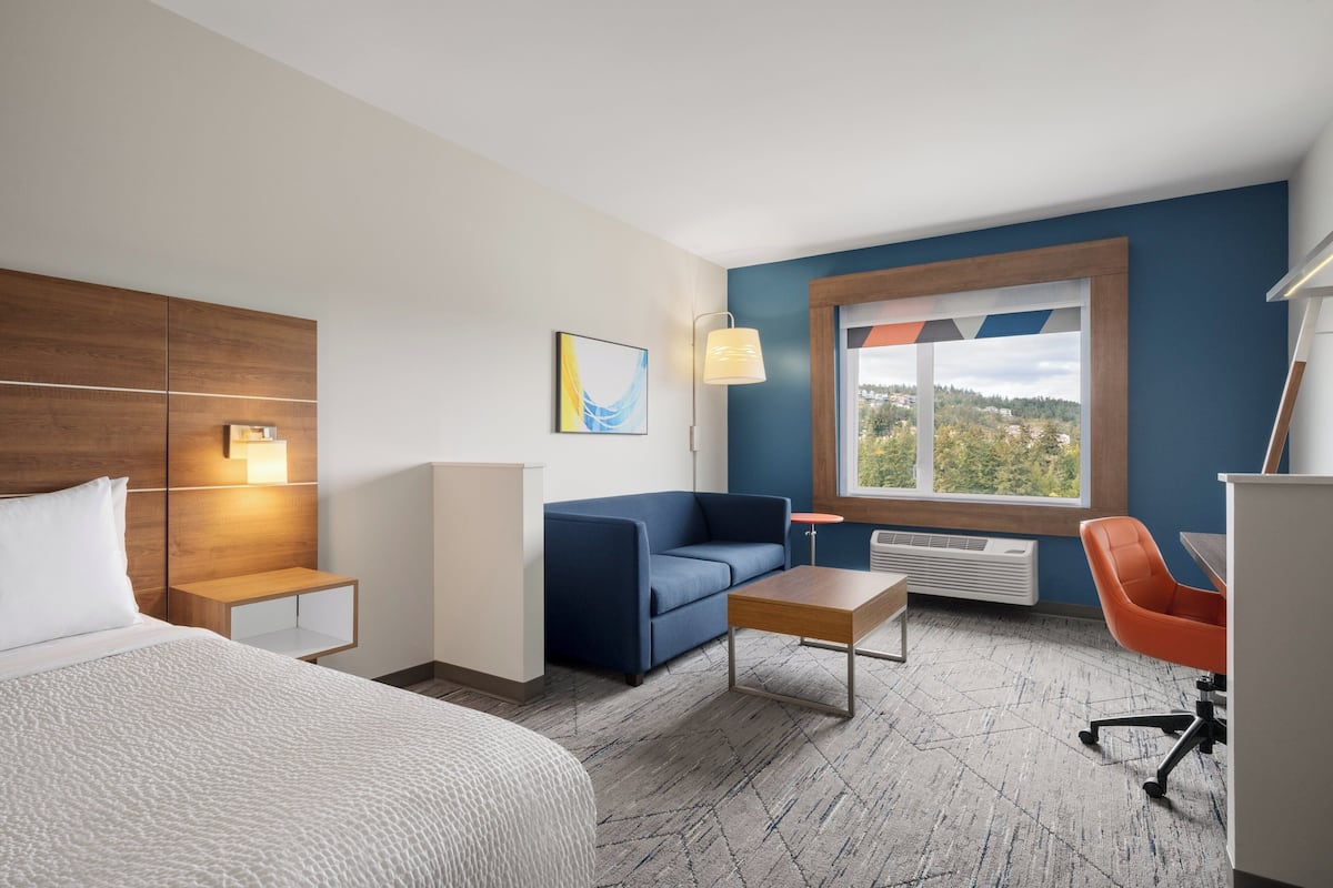 Suite, 1 trÚs grand lit et 1 canapé-lit | Coffres-forts dans les chambres, bureau