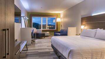 Suite, 1 King Bed with Sofa bed | In-room safe, desk, laptop workspace, blackout drapes