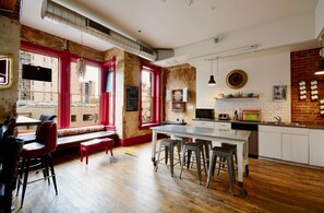 Fridge, microwave, coffee/tea maker, dining tables