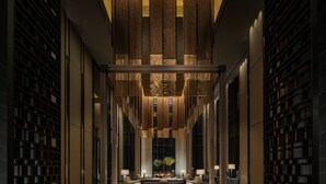 A spacious lobby with a central seating area, large windows, and a modern design. - Four Seasons Hotel Seoul (Seoul)
