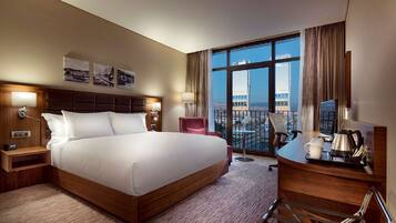 Habitación, 1 cama King size | Ropa de cama de alta calidad y minibar