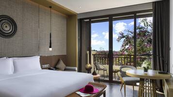 Premium bedding, down comforters, pillowtop beds, minibar