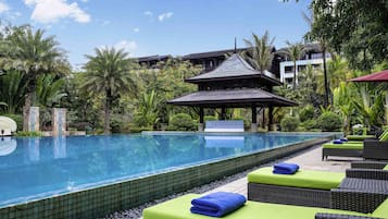 Indoor pool, outdoor pool, pool umbrellas, pool loungers