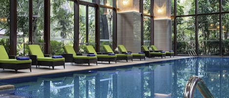 Indoor pool, outdoor pool, pool umbrellas, pool loungers