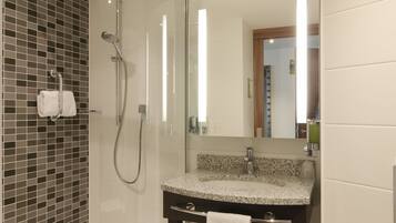 Combined shower/tub, free toiletries, hair dryer, bathrobes