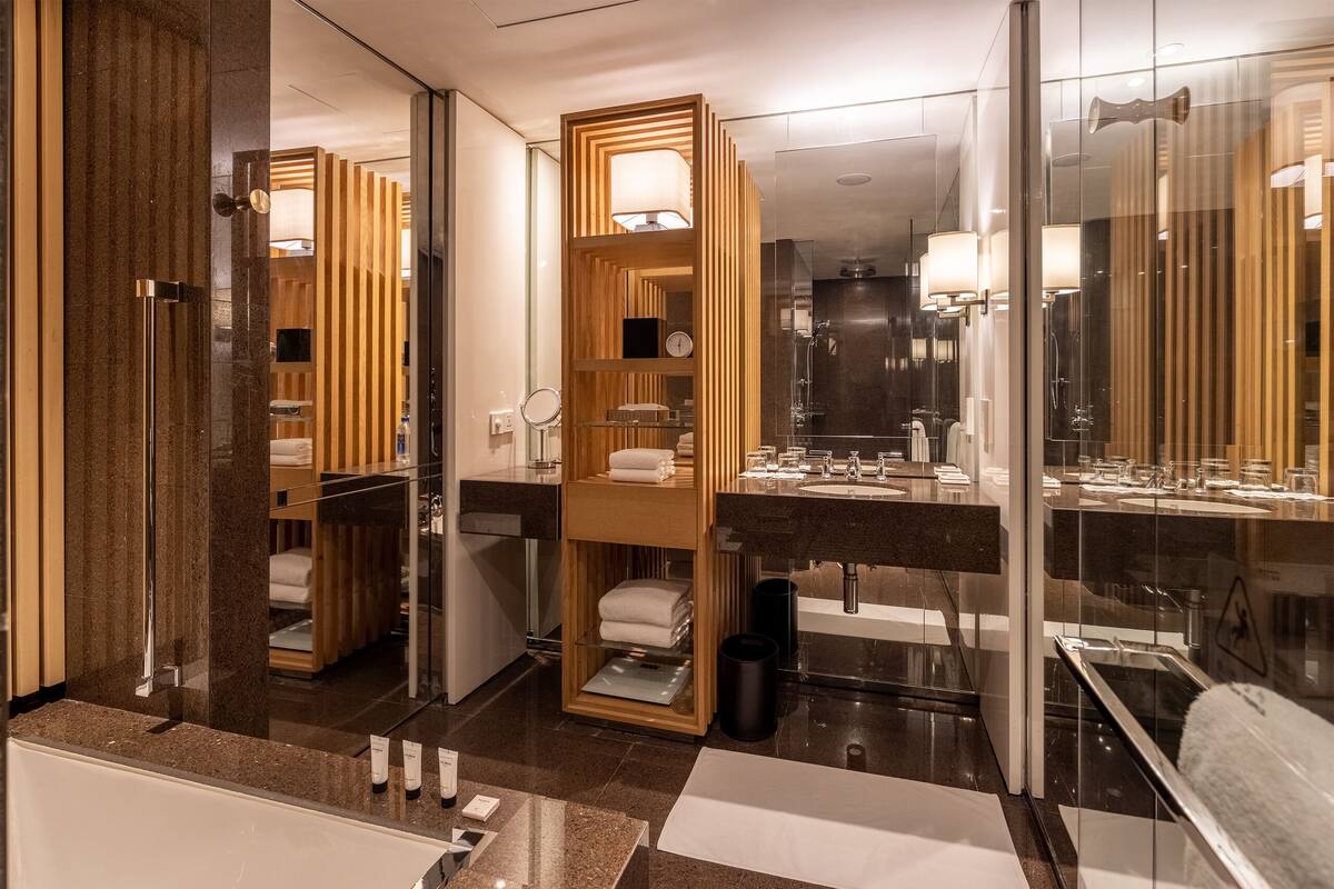 separate bathtub and shower, deep-soaking bathtub, rainfall showerhead