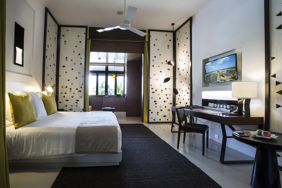 premium bedding, free minibar items, in-room safe