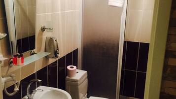 Shower, free toiletries, hair dryer, slippers