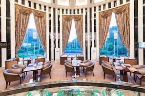 Breakfast, lunch, dinner served; local and international cuisine