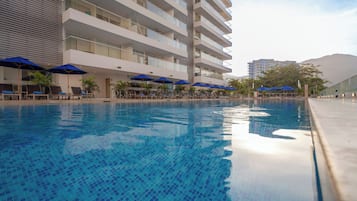 Outdoor pool, open 9:00 AM to 9:00 PM, pool loungers