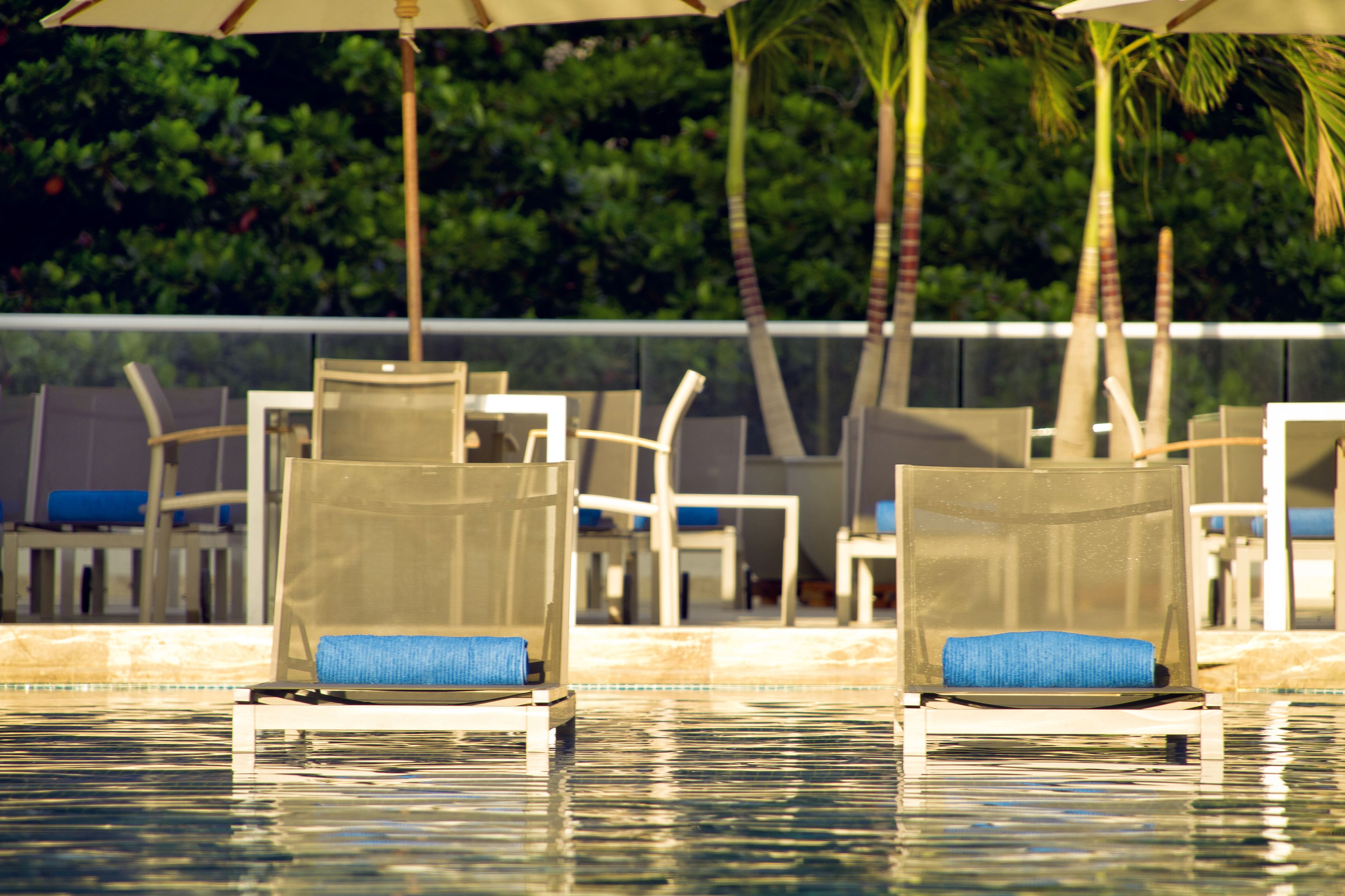 outdoor pool, open 9:00 am to 9:00 pm, pool loungers