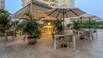 Outdoor pool, open 9:00 AM to 9:00 PM, sun loungers