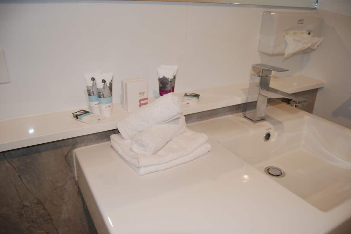 superior room, 2 queen beds | bathroom amenities | eco-friendly toiletries, hair dryer, towels