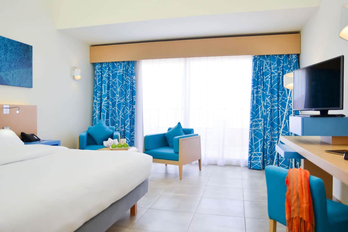 Free minibar items, in-room safe, desk, iron/ironing board