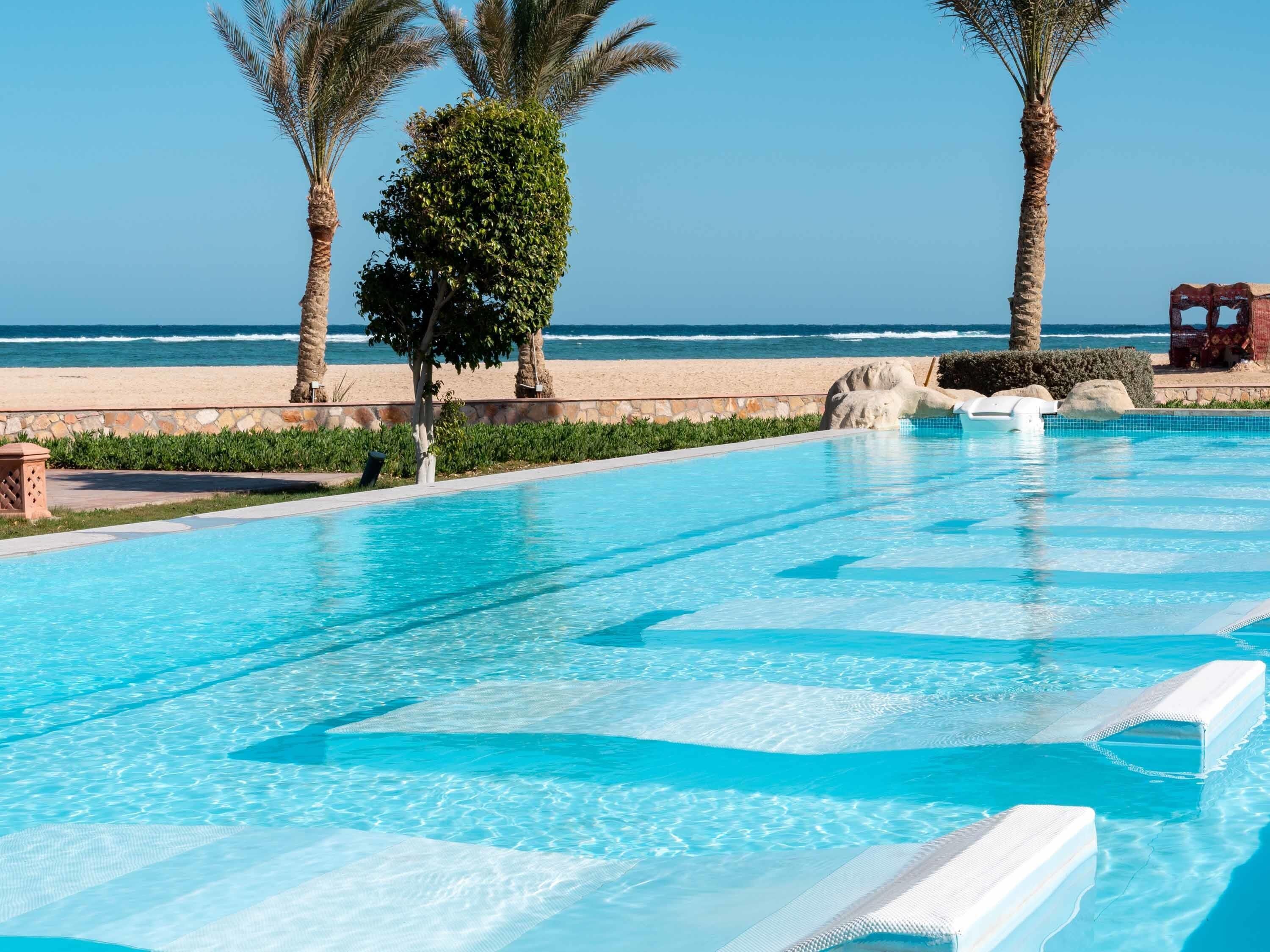 indoor pool, 3 outdoor pools, pool umbrellas, pool loungers