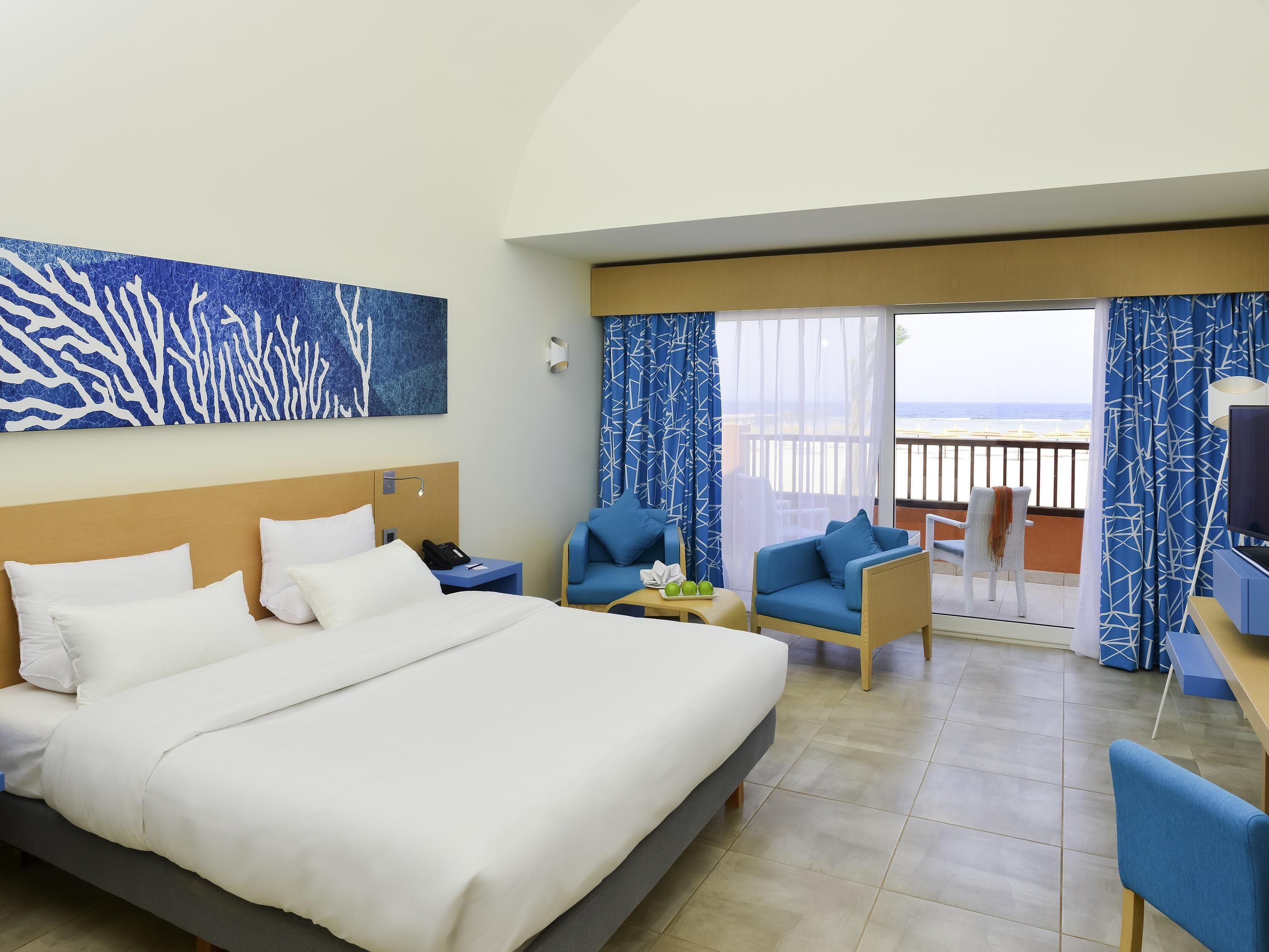 Standard Room, 2 Single Beds (Sea Front) | Free minibar items, in-room safe, desk, iron/ironing board