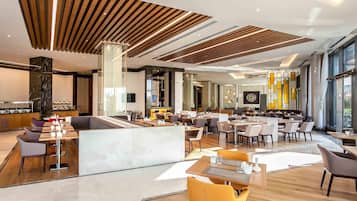 Breakfast, lunch, dinner served; international cuisine